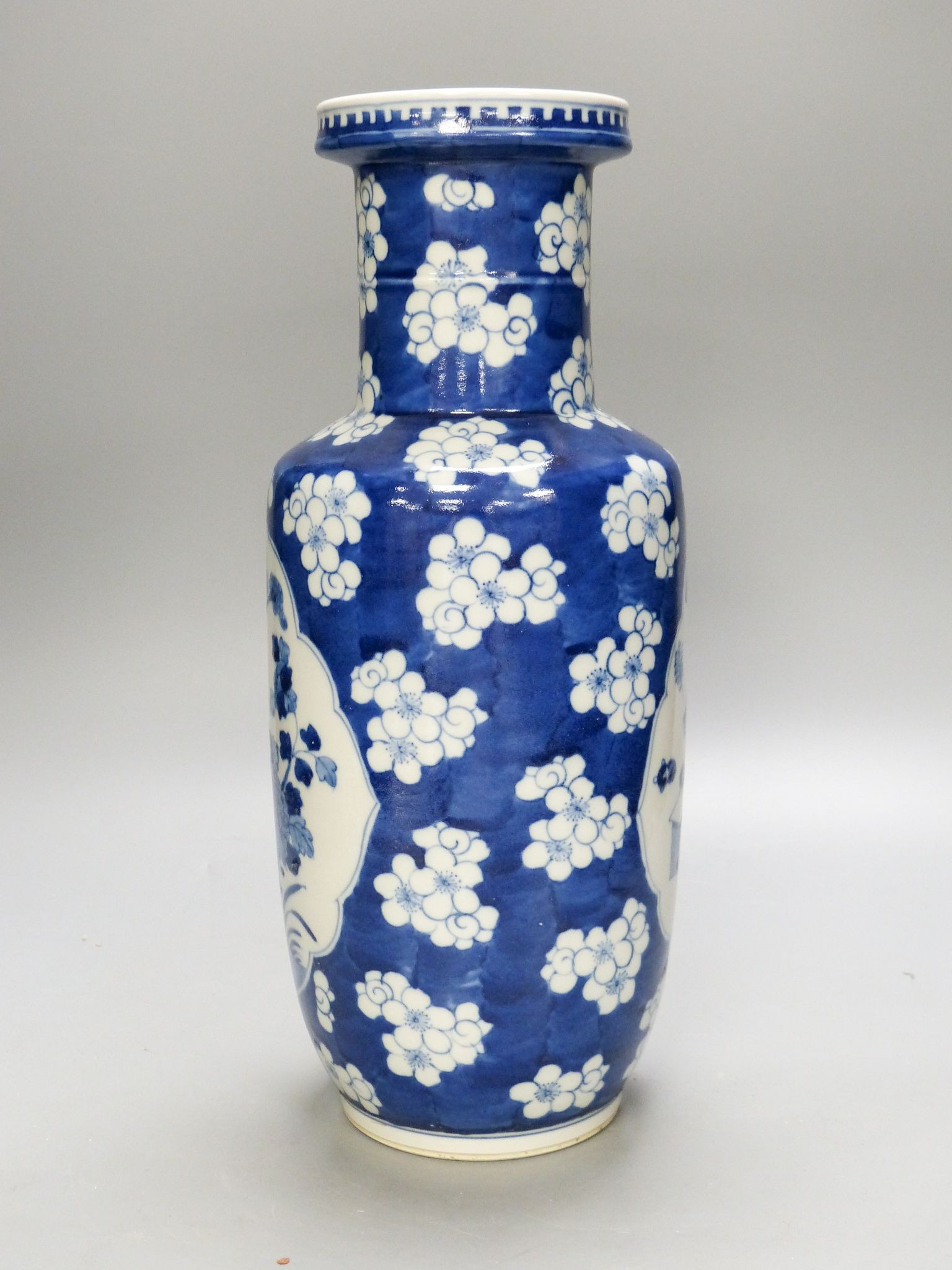 A Chinese blue and white ‘prunus’ rouleau vase, 35cm